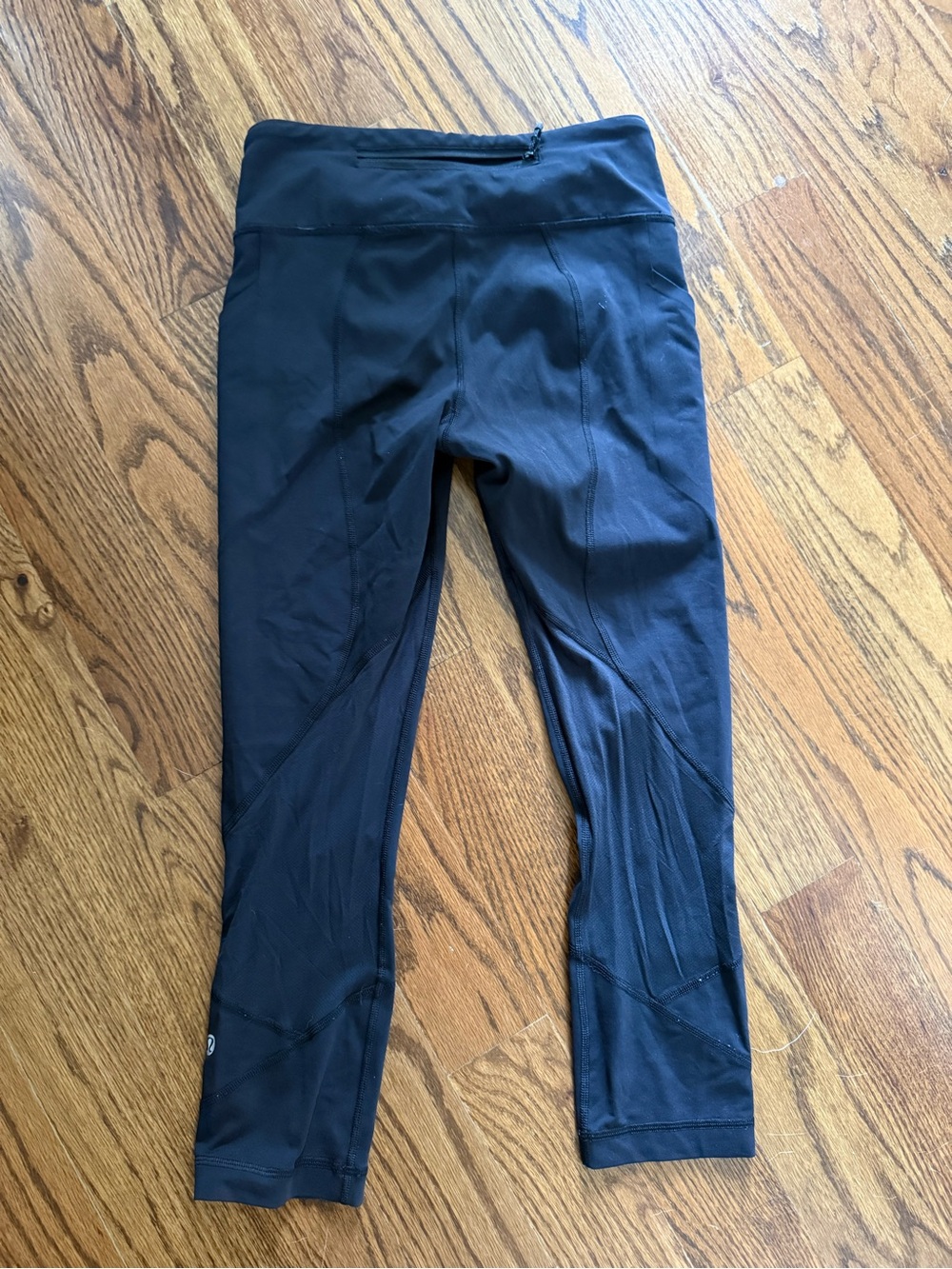 lululemon Leggings with sort of a mesh area as shown. Shorter length